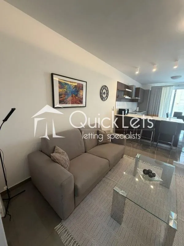 Bright airy two-bedroom apartment with two bathrooms and front terrace