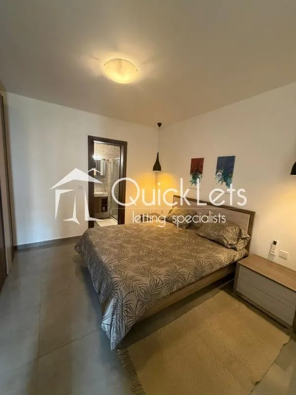 Bright airy two-bedroom apartment with two bathrooms and front terrace