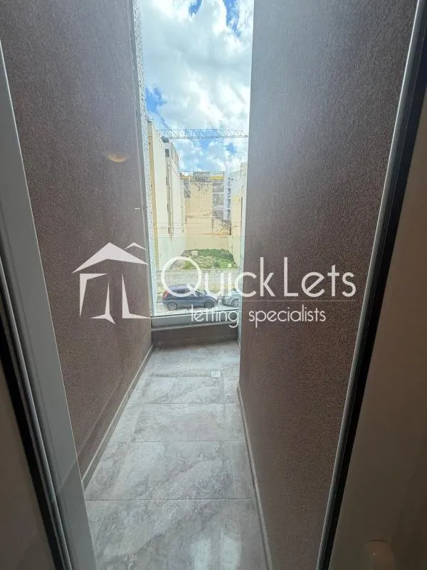 Bright airy two-bedroom apartment with two bathrooms and front terrace