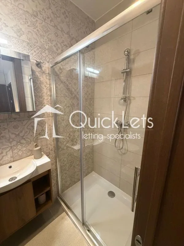 Bright airy two-bedroom apartment with two bathrooms and front terrace