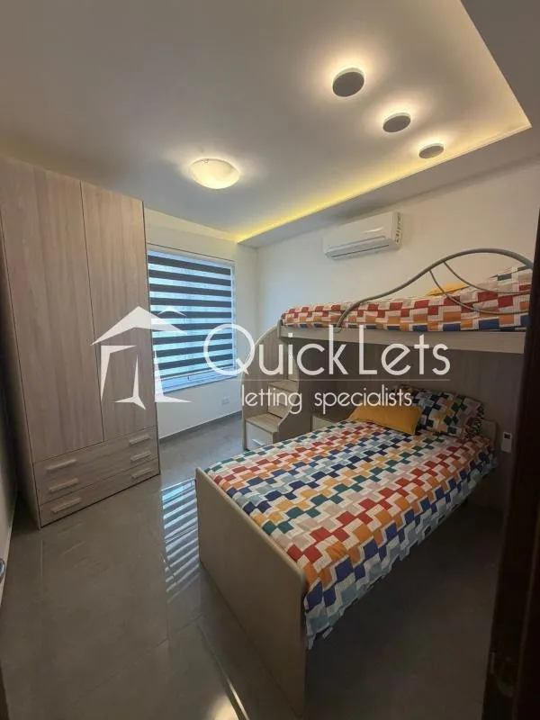 Bright airy two-bedroom apartment with two bathrooms and front terrace