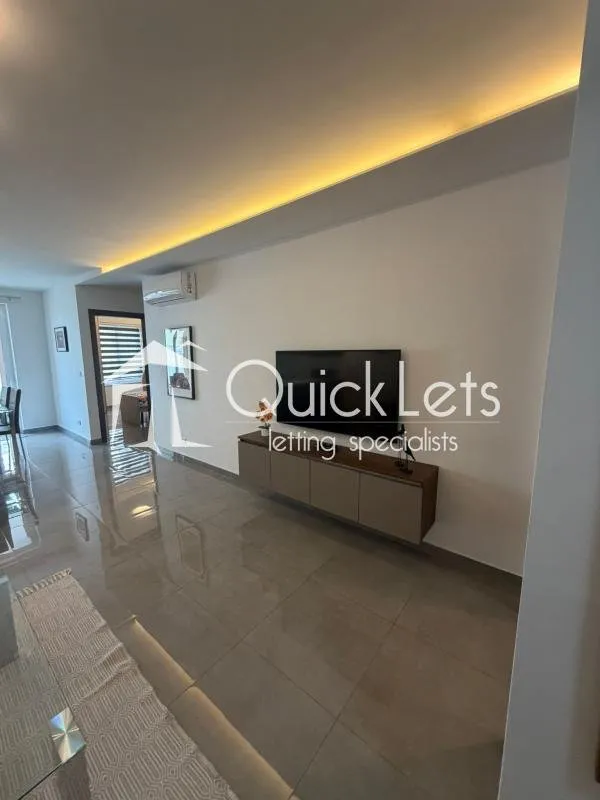 Bright airy two-bedroom apartment with two bathrooms and front terrace