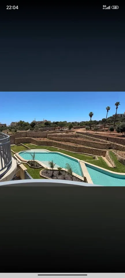 Qala Brand New- Apartment with Common Pool and Garden