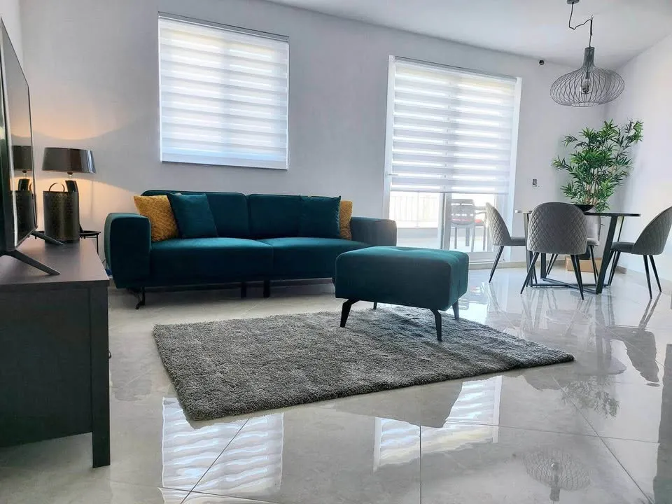 Gzira Ultra Modern Apartment close all Amenities with : 2 Double Bedrooms + 1 Bathrooms Large & Furnished Terrace with Table & Chairs Ideal for BBQ'S